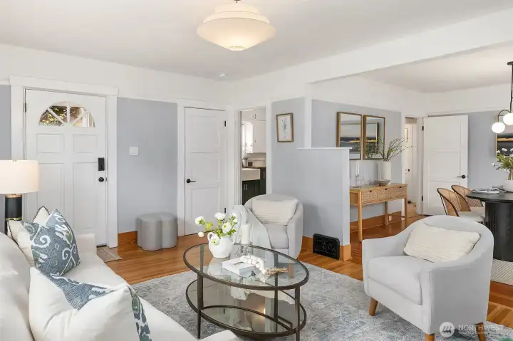 Living opens to dining and kitchen.