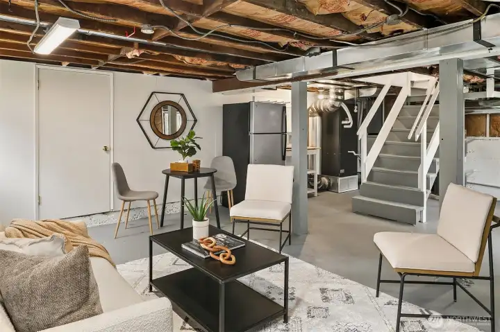 Basement has second fridge, newer furnace and laundry.