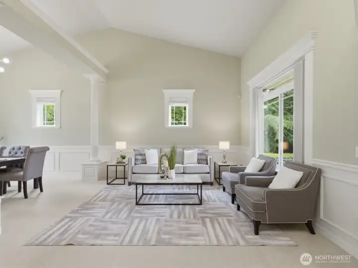 Large formal living and dining to the right of the front door are perfect for hosting gatherings