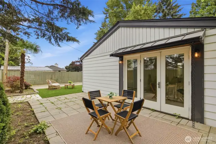 French Doors from the Primary flow out to the patio.