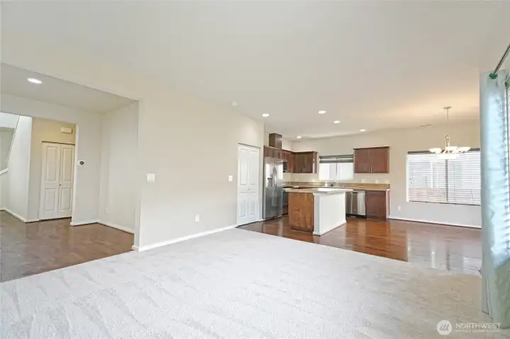 Walk through a formal dining space into the great room with brand new carpet Walk through a formal dining space into the great room with brand new carpet