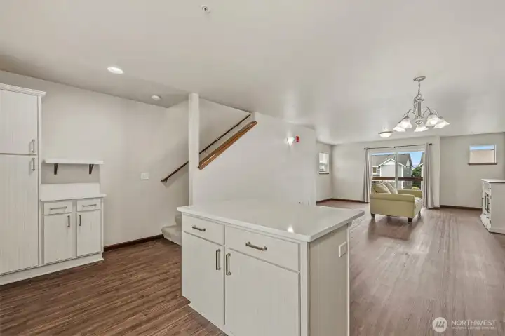 Updated kitchen with quartz countertops. New Range and refrigerator.