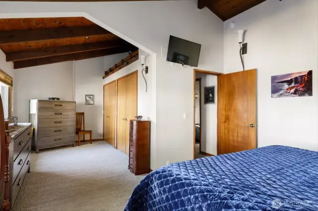 Primary Bedroom showing dressing area, closet & loft