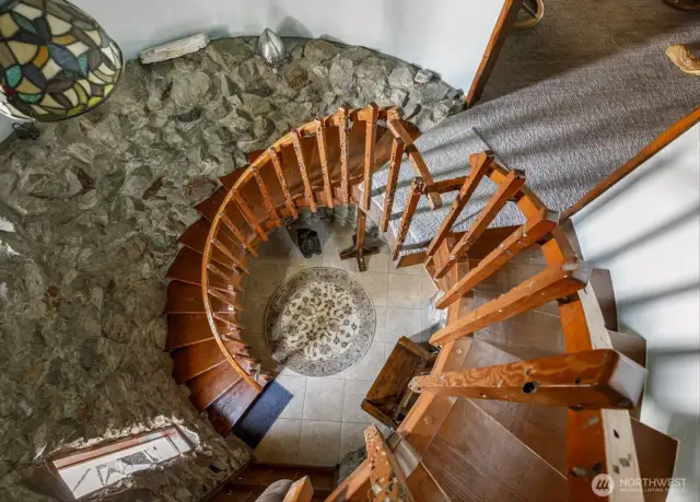 The "nautilus" stairs have railings crafted of wormwood.