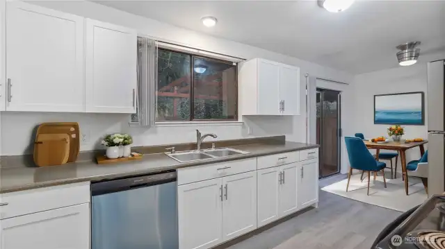 Large window above the sink allows you to enjoy the private, tranquil location. **Virtually Staged**