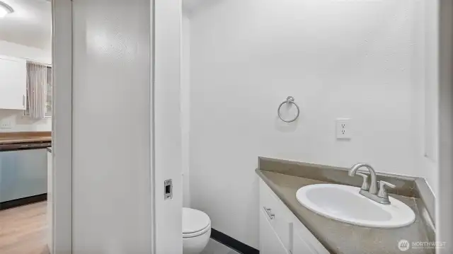 Half bath just off the entry and the main living spaces.