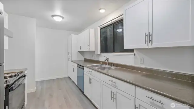 Just off the dining area is another slider with access to your private back deck.