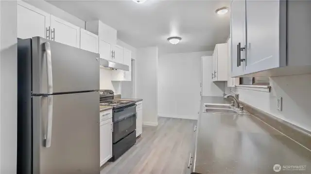 This angle showcases more of the storage space this kitchen offers.