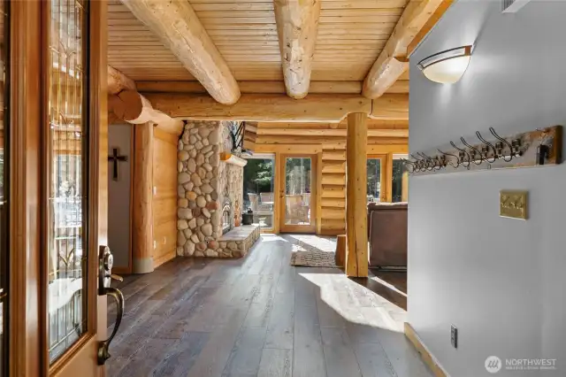 Beautiful log work from the second you walk in the door.