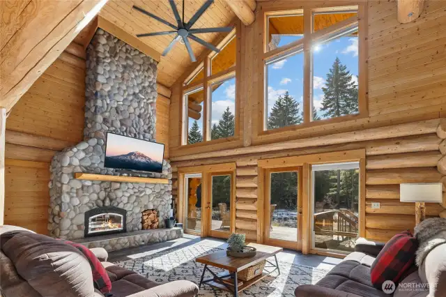 Beautiful stone fireplace with wood storage to keep you cozy!