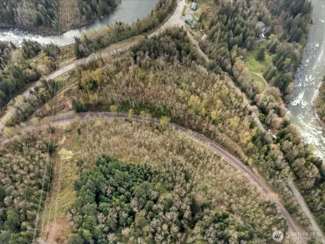 Aerial view, property is a cresent shape that follows the roads & railroad tracks (minus part of the corner where Galena rd & Hwy 2 meet)