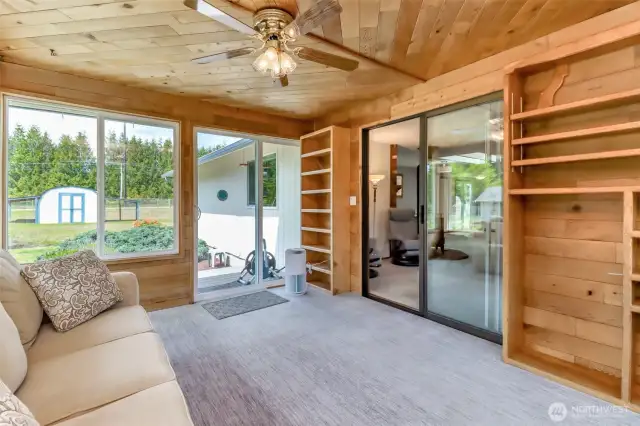 This sunroom is such a bonus. The same quality wool carpet and cedar ceiling makes for a comfy, airy space.