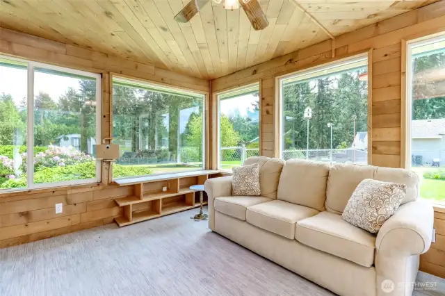 Wonderful sunlit space with a ceiling fan, as well. Photos were taken with furniture in the home, but all pieces  furniture have been removed. The house is vacant and empty.