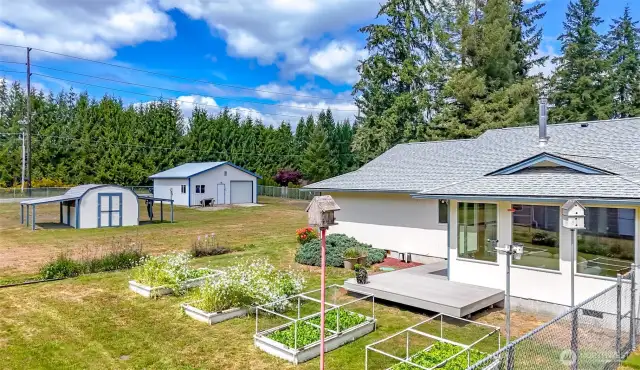 Wonderful space for flowers and garden beds with lots of sunshine! See also the newly built composite deck - just 3-1/2 years old. Step outside from the sunroom, and enjoy this 86 square foot deck!