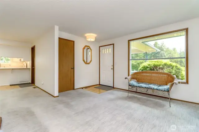 Front door enters into living room / great room. Notice the quality carpet, just a few years old - Selden's Kaleen    100% handmade wool carpet. It cost over $15,000.