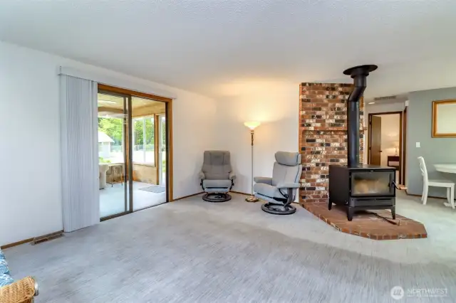 Looking the other way, you see the 3-year-old Blaze King BX24.1 solid fuel wood catalytic stove and slider to the left going out into the sunroom.