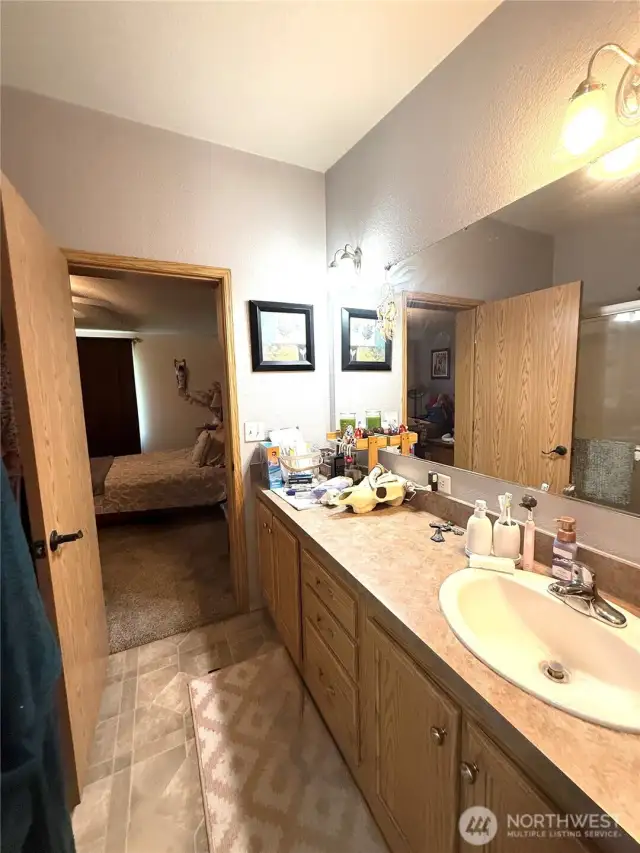 En suite bathroom with shower and soaking tub