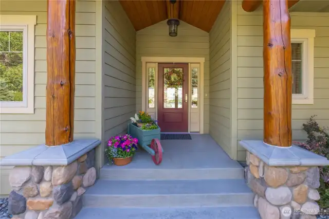 Log Posts & Wood Soffits Accent Covered Porch