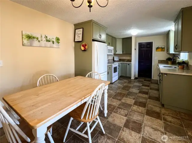 Kitchen opens up to eating space