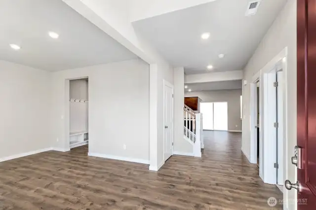 Bright and grand entrance open to above allowing a ton of natural light. Photos are for representational purposes only. Some colors and finishes may differ.