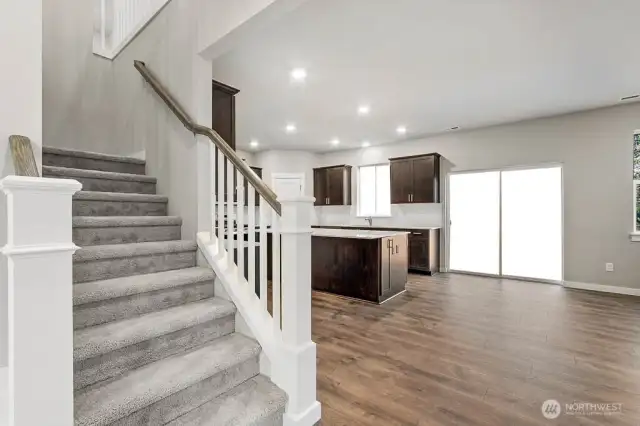 Open rail on the staircase for that formal finish. Photos are for representational purposes only. Some colors and finishes may differ.