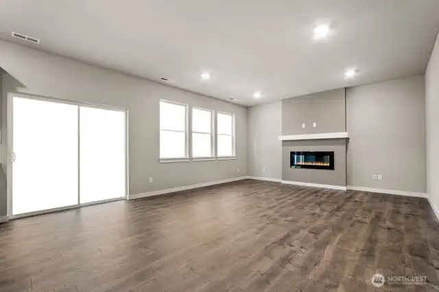 Extended laminate flooring throughout the main. Photos are for representational purposes only. Some colors and finishes may differ.