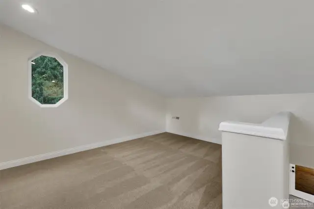 Bonus loft bedroom, perfect for guests, a playroom, or creative space.