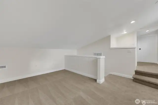 Bonus loft bedroom, perfect for guests, a playroom, or creative space.