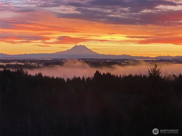 Sunset and sunrise are spectacular from the deck and inside this home!