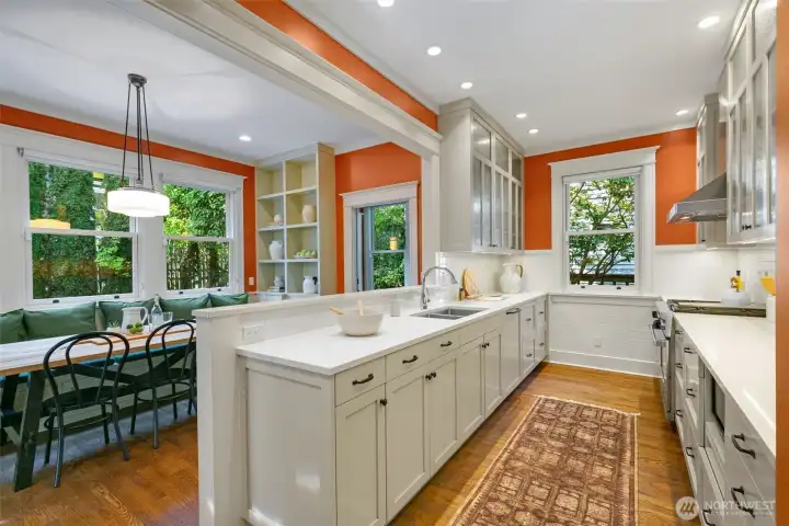 The bright, expansive cher's kitchen is the tru heartbeat of the home with loads of cabinetry for any and all kitchen gadgets