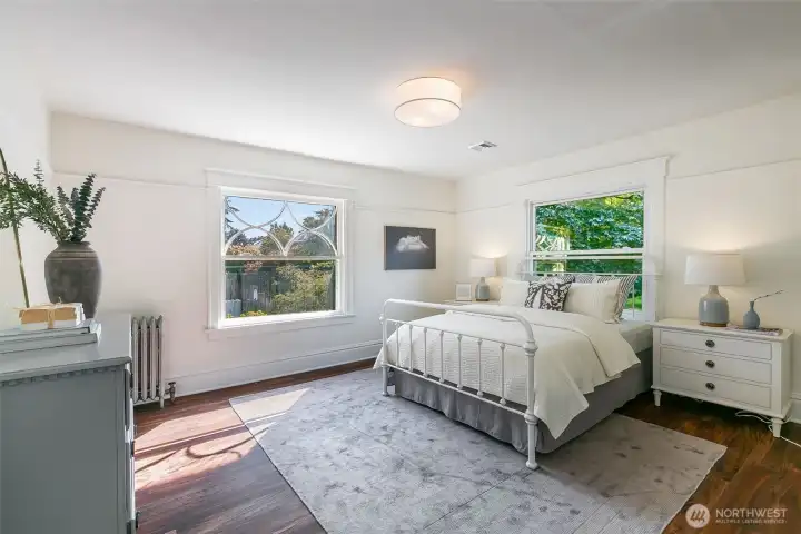 Southwest corner bedroom looks out to back and side yards