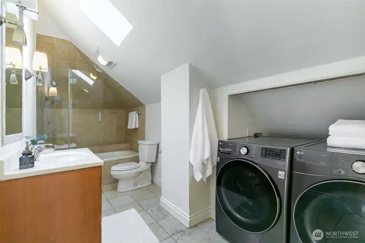 3rd floor bathroom with laundry area