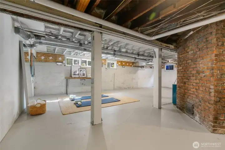 The basement with laundry area and wine cellar has extra high ceilings and plenty of room for storage.