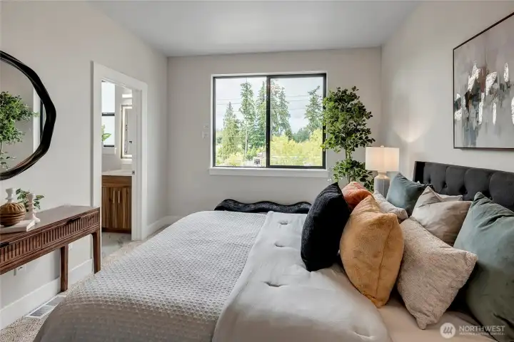 Bedroom with en-suite bath downstairs 1/2 bath (model home lot 1A, colors may vary)