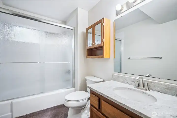 Second full bath on lower level.