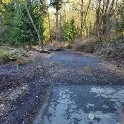 01-Directions to property. Continue off paved surface at end of street onto gravel road trail to property.
