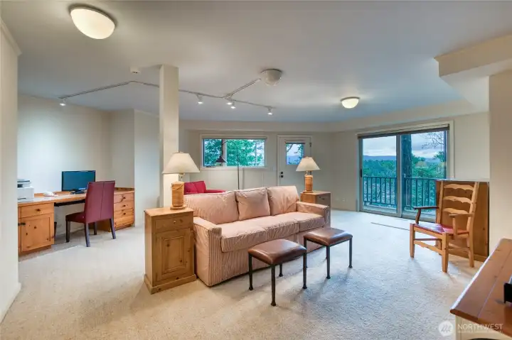 The bonus room has a personal deck and another door to the exterior.