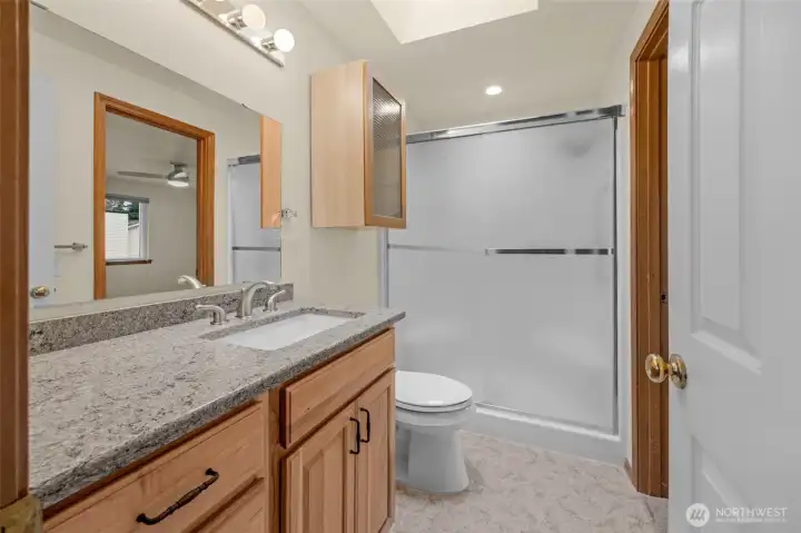 Walk-in shower in Primary BR ensuite bath.