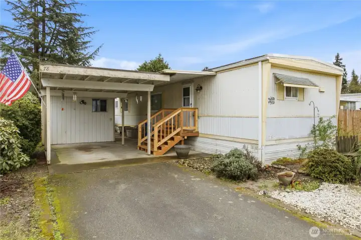Covered parking with new staircase to entry