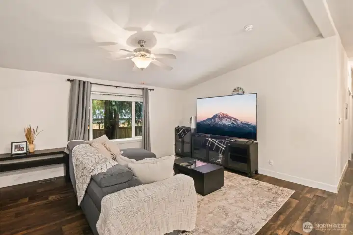 Spacious living area with flexible layout options for seating and entertainment.