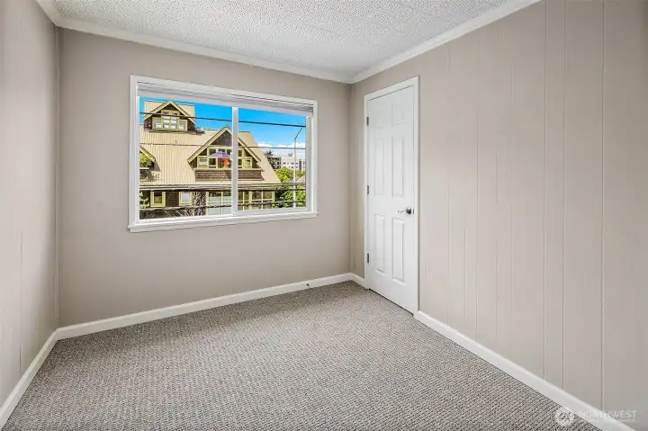Top floor unit looks out at the roofline of neighboring Capitol Hill buildings.
