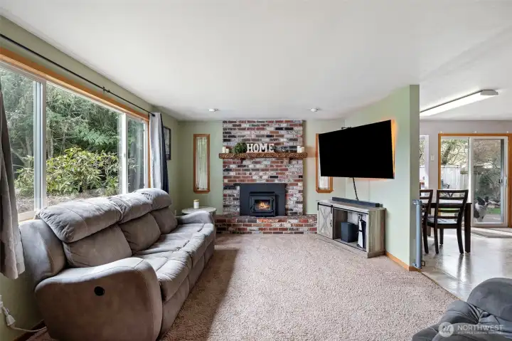 Cozy living space with wood fireplace