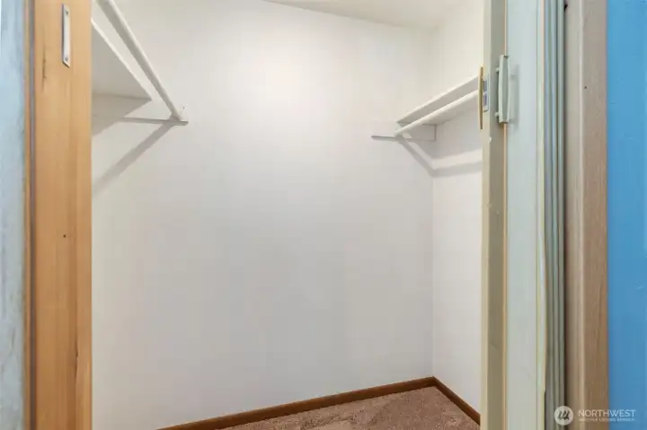 Walk-in primary closet Walk-in primary closet
