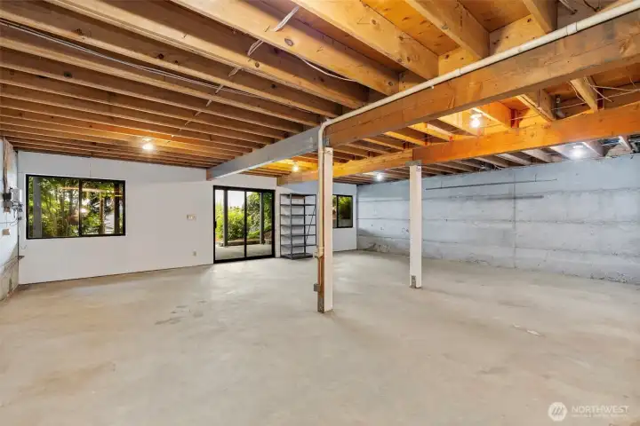 Basement level offers huge opportunity for expansion. Boasting a fully finished full bathroom, with 1,500 additional sq ft of partially finished space. Incredible views exist from the basement level, making it the ideal spot for a home gym, classroom, or hobby space. Basement level offers huge opportunity for expansion. Boasting a fully finished full bathroom, with 1,500 additional sq ft of partially finished space. Incredible views exist from the basement level, making it the ideal spot for a home gym, classroom, or hobby space.