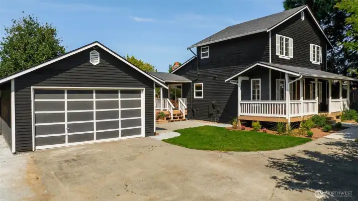 Detached garage steps from entrance