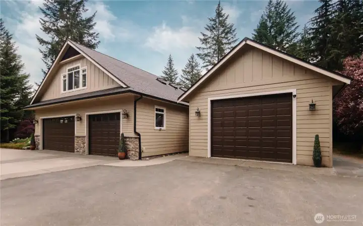Three car garage and a large detached shop!