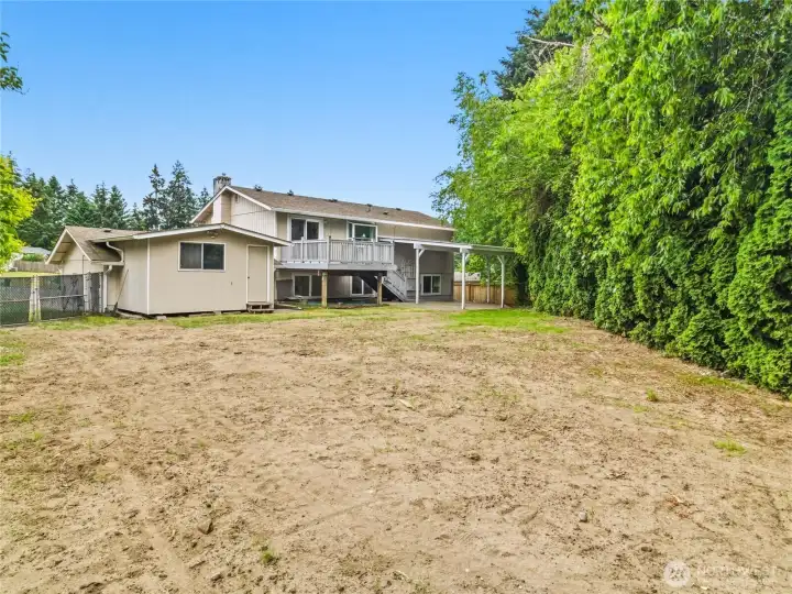 Large private backyard- ready for you to make it into your dream yard!