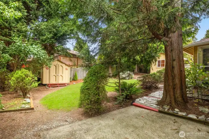 Peaceful outdoor setting with multiple spaces to relax and unwind.