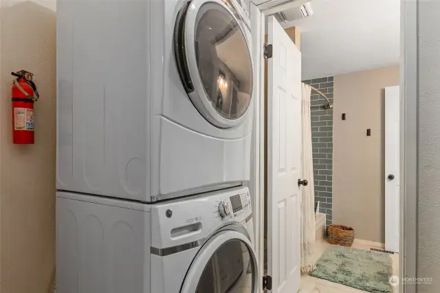 Newer washer-dryer is conveniently located just off the primary bathroom.