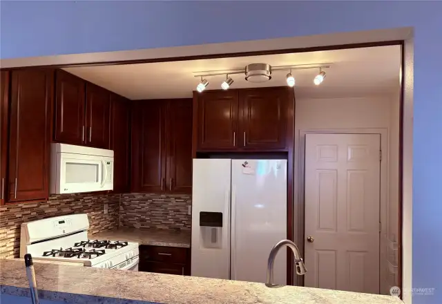 Kitchen over looks great room.